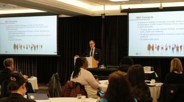 Dr. Peter Smith, IWH president and senior scientist, addresses IWH Connects attendees in April 2025.