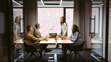 Workers in a business meeting.