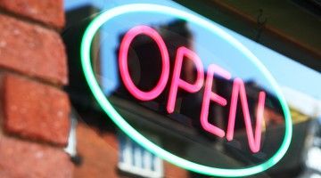 Close-up of a neon "open" sign