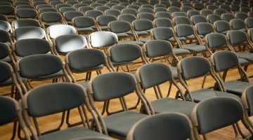 Rows of chairs in auditorium