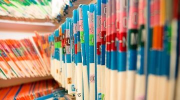 Shelves of colourful file olders in a medical office