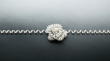 A tangled telephone cord 