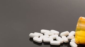 Pills spill form prescription bottle Thumbnail
