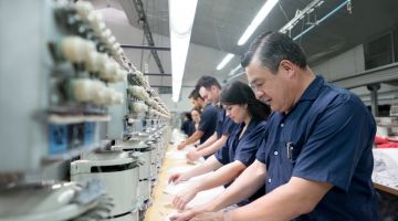 Assembly line workers in embroidery factory Thumbnail