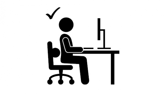 figure sitting at computer