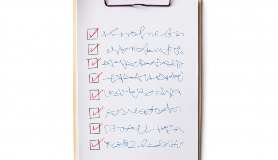 A checklist of eight items on a clipboard