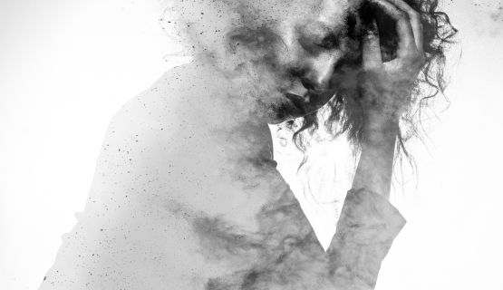Monochrome splatter painting of a woman in distress
