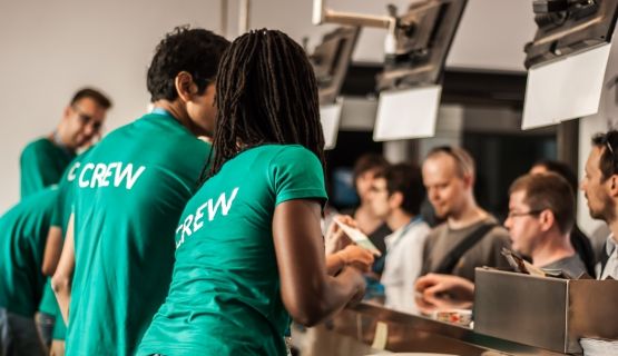 Young workers at service counter