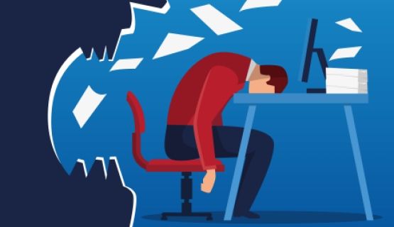A worker slumps over in fatigue and defeat, next to an angry boss and a desk piled high with work